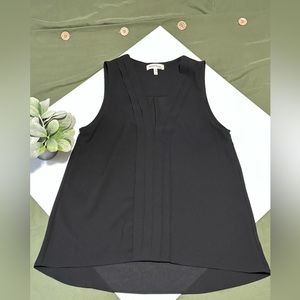 Women’s black sleeveless tops.